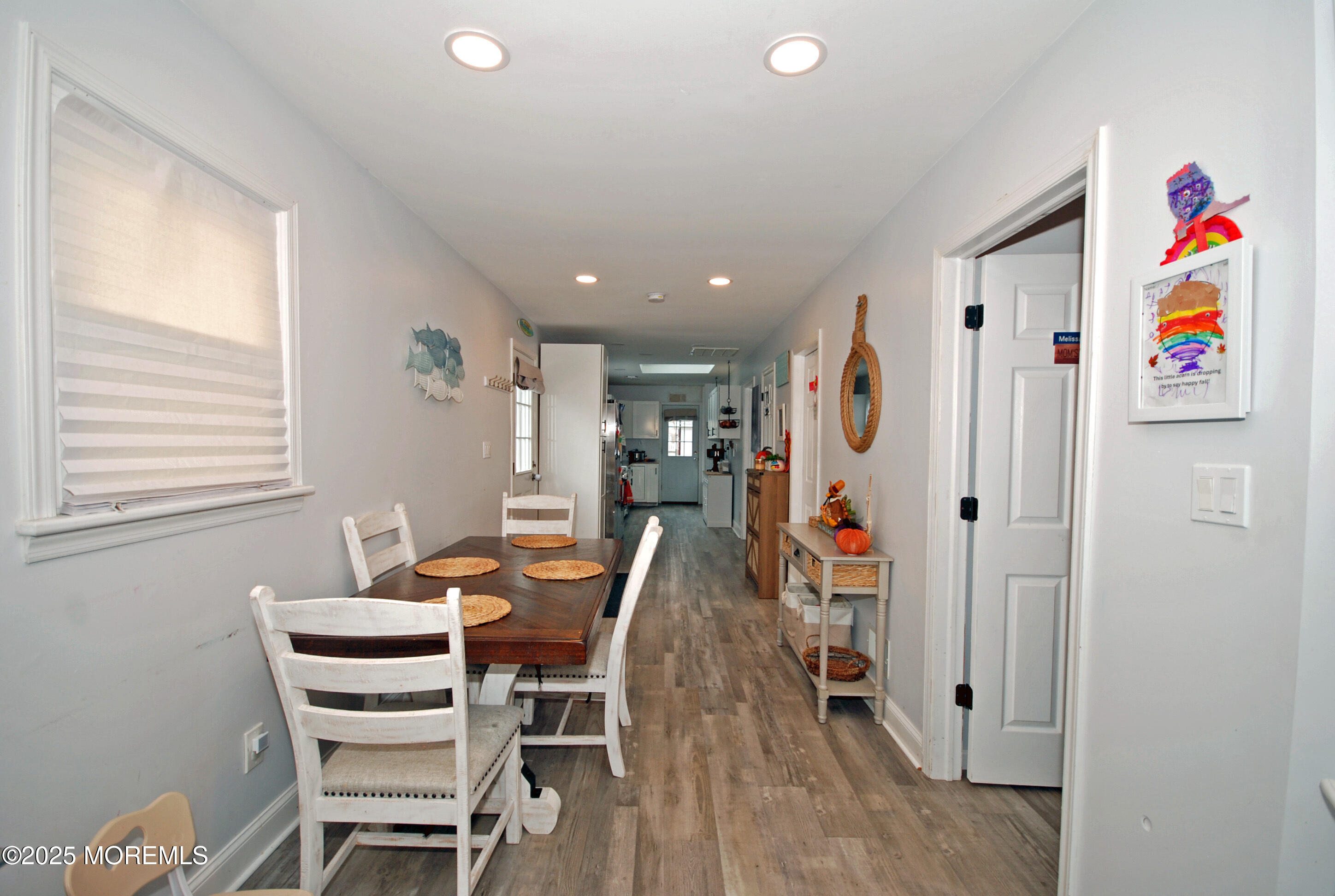 25 Beach Boulevard Highlands, NJ 07732 - Photo 10 of 32 a view of a dining room with furniture and wooden floor
