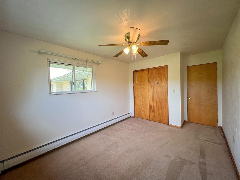 115 Grohman Road Butler, PA 16002 - Photo 17 of 39 an empty room with windows and fan