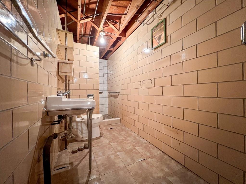 115 Grohman Road Butler, PA 16002 - Photo 30 of 39 a bathroom with a sink and mirror