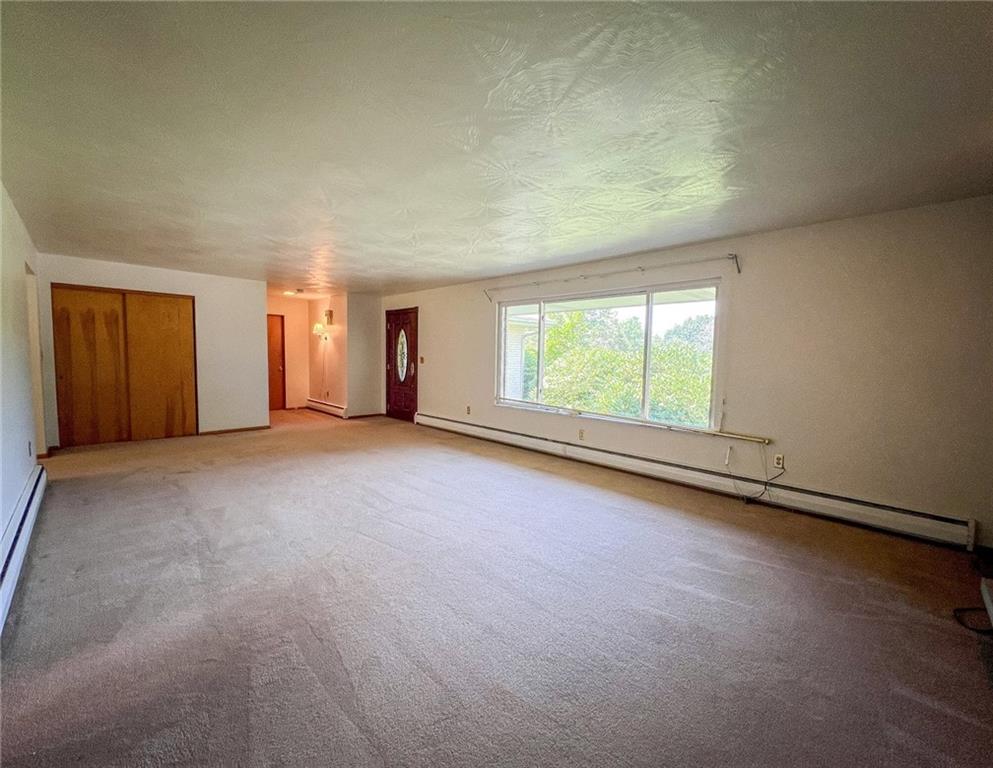 115 Grohman Road Butler, PA 16002 - Photo 6 of 39 an empty room with windows