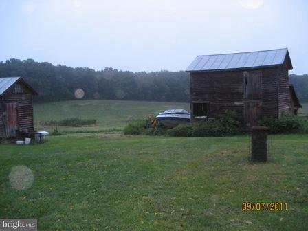 5578 Sumerduck Road Sumerduck, VA 22742 - Photo 1 of 4 a view of a back yard