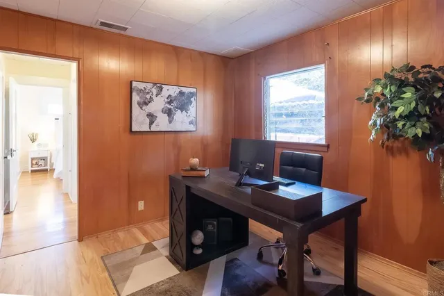 a view of a workspace with furniture