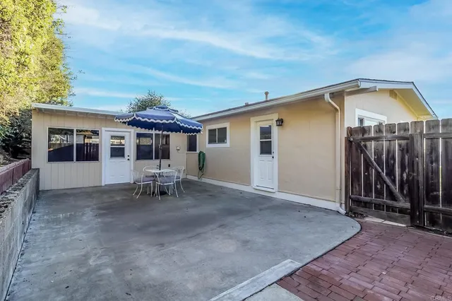 a view of a house with a street