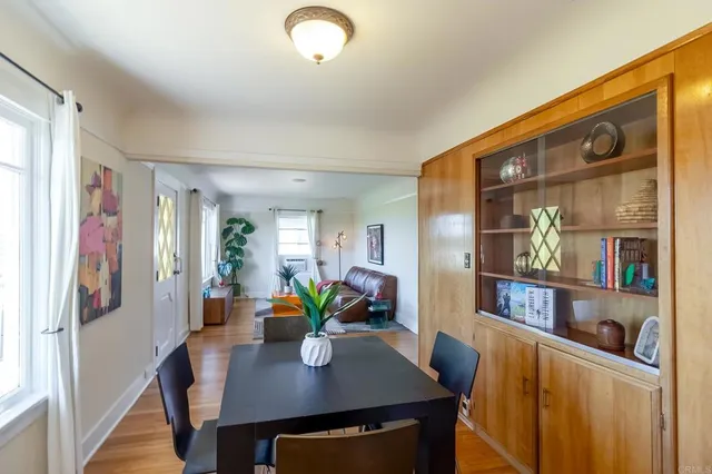 a kitchen with stainless steel appliances granite countertop sink stove and refrigerator