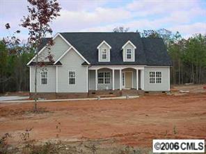 4163 Fletcher Funderburk Road Lancaster, SC 29720 - Photo 2 of 8 front view of a house with a yard