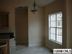 4163 Fletcher Funderburk Road Lancaster, SC 29720 - Photo 4 of 8 a view of an empty room with a window