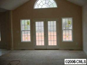 4163 Fletcher Funderburk Road Lancaster, SC 29720 - Photo 5 of 8 an empty room with a window