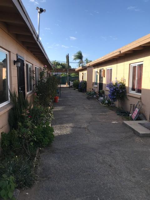 809 South Maple Avenue Fresno, CA 93702 - Photo 2 of 4 a view of a house with backyard and garden