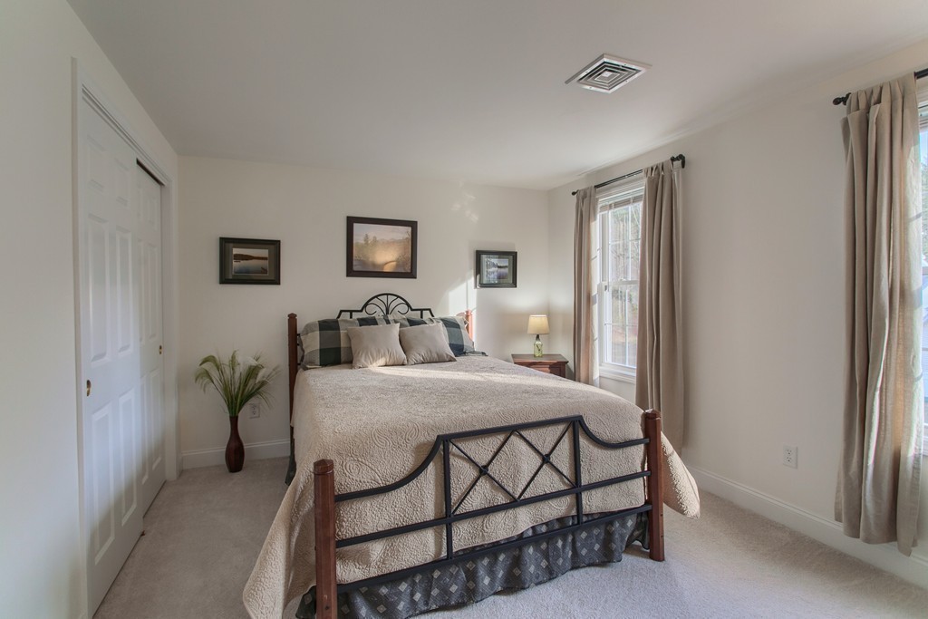 62 Emery Road Townsend, MA 01469 - Photo 20 of 30 a bedroom with a bed and window