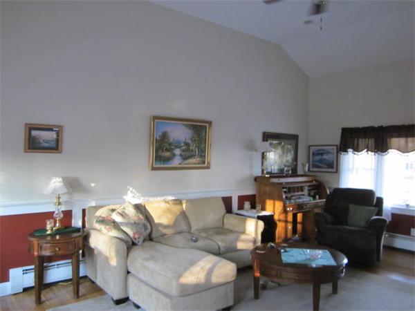 541 Hatherly Road Scituate, MA 02066 - Photo 11 of 11 a living room with furniture a window and a lamp