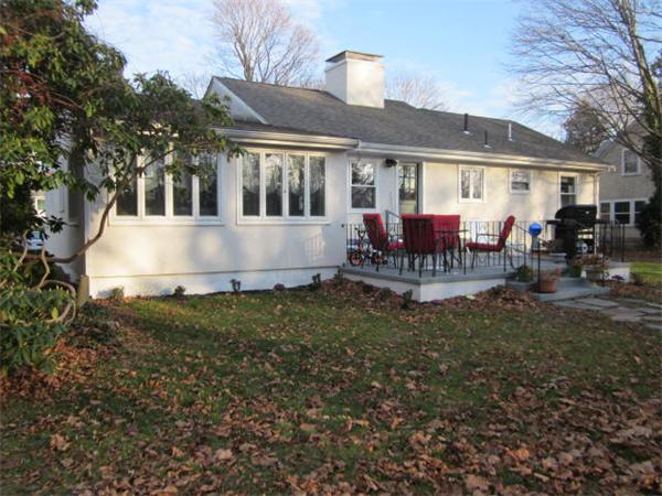 541 Hatherly Road Scituate, MA 02066 - Photo 3 of 11 a view of a house with a patio and a yard