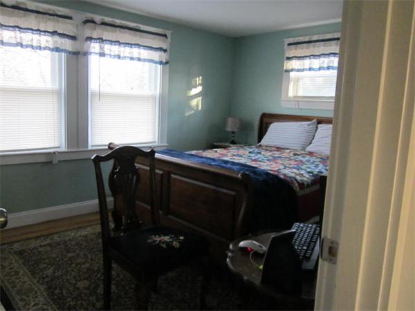541 Hatherly Road Scituate, MA 02066 - Photo 9 of 11 a bedroom with a bed and a window