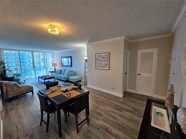 a workspace with furniture and wooden floor