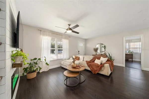 a room with furniture and a wooden floor
