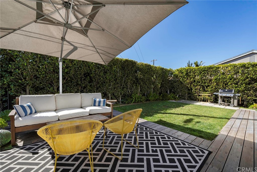 277 Knox Place Costa Mesa, CA 92627 - Photo 12 of 21 a view of a swimming pool with a patio
