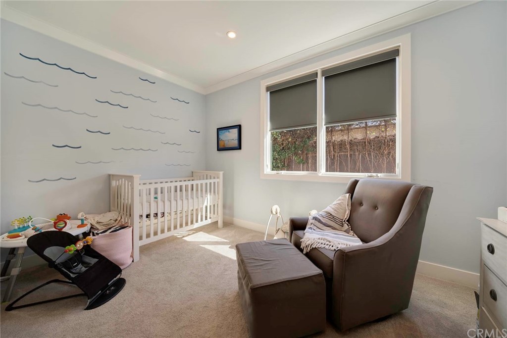 277 Knox Place Costa Mesa, CA 92627 - Photo 20 of 21 a living room with furniture and a window