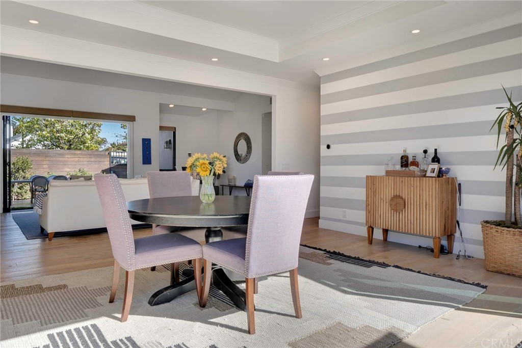 277 Knox Place Costa Mesa, CA 92627 - Photo 8 of 21 a view of a dining room with furniture and a window