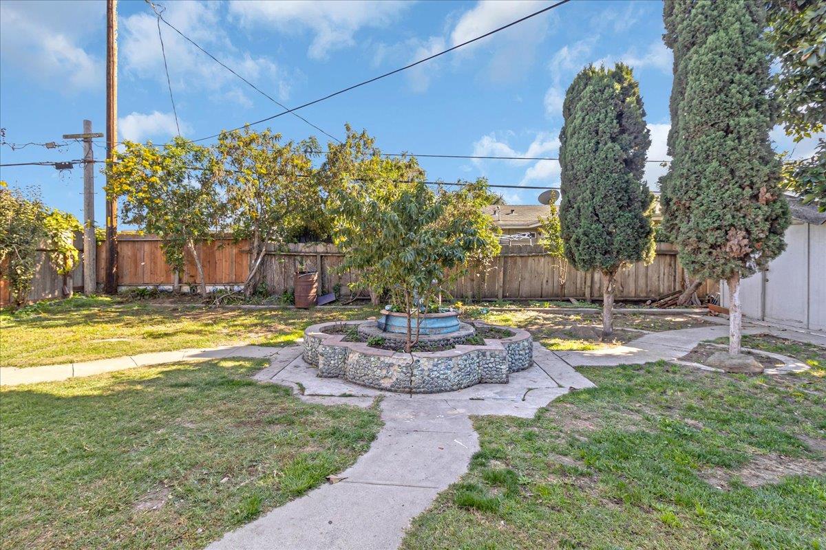 1238 Granada Avenue Salinas, CA 93906 - Photo 25 of 36 a swimming pool with outdoor seating and yard