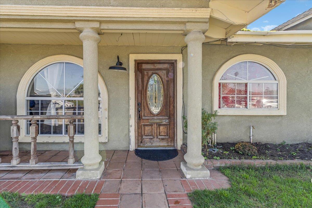 1238 Granada Avenue Salinas, CA 93906 - Photo 6 of 36 a front view of a house with garden