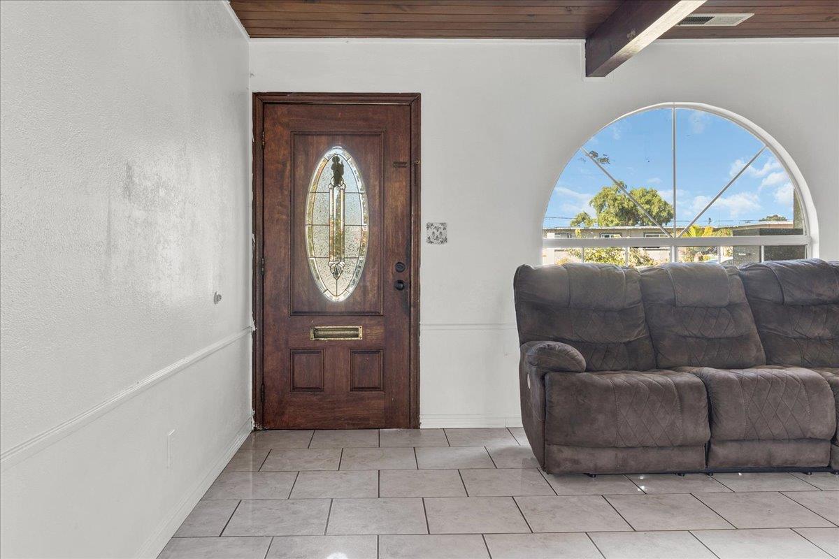 1238 Granada Avenue Salinas, CA 93906 - Photo 7 of 36 a living room with furniture and a window