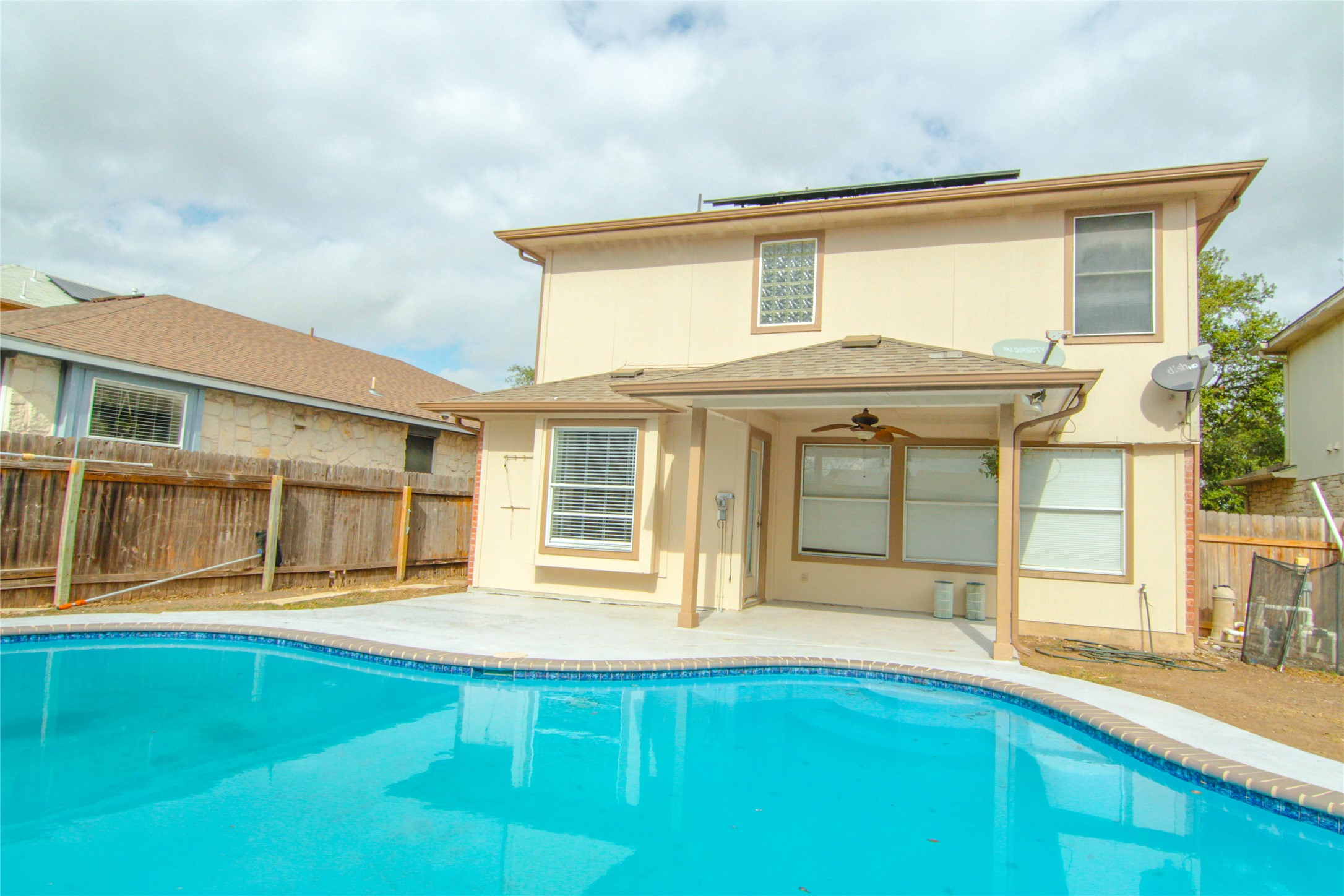 1431 Roxanne's Run Pflugerville, TX 78660 - Photo 28 of 29 Back of house with a patio, a fenced backyard, ceiling fan, and roof with shingles