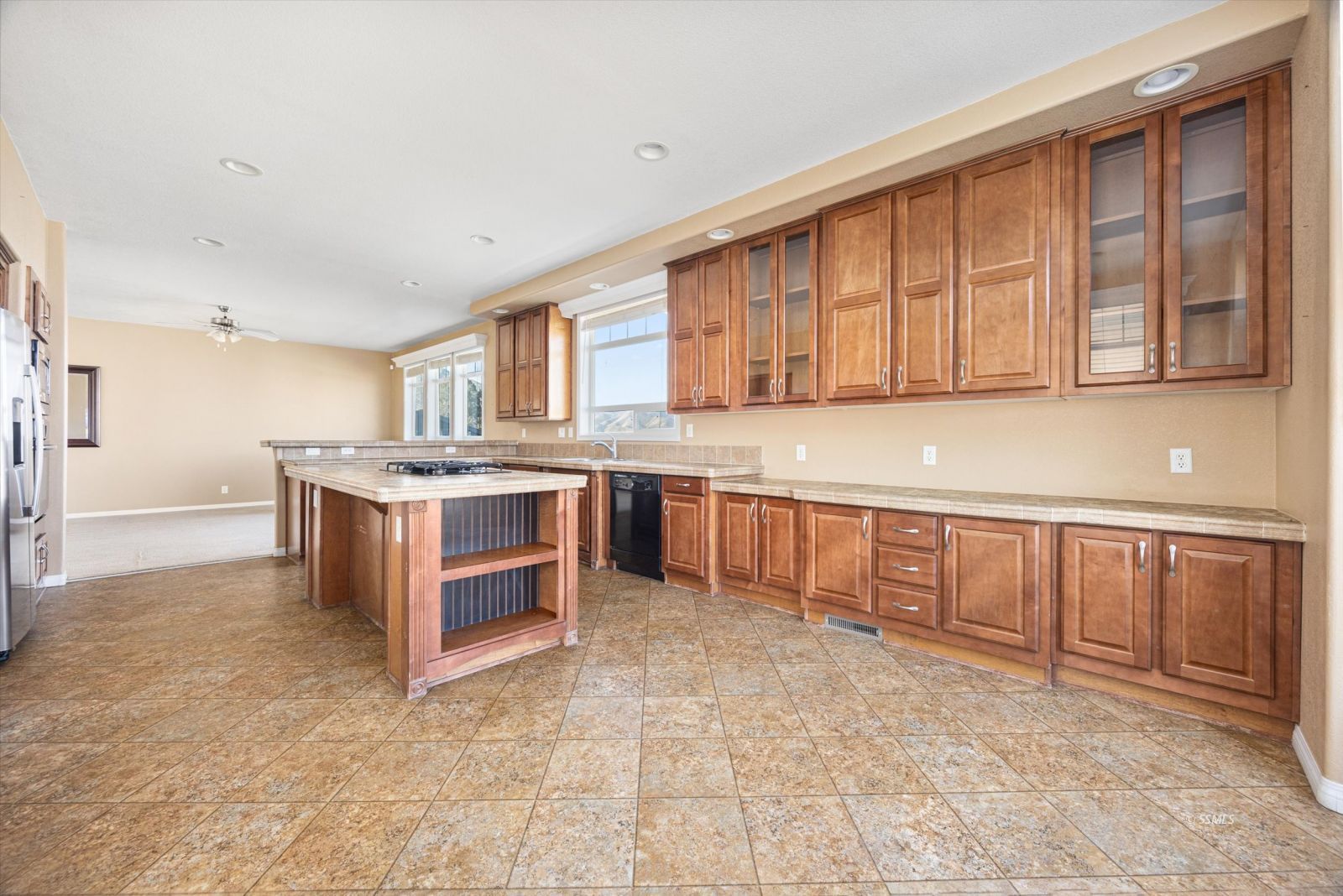 4131 Brooks Road Weldon, CA 93283 - Photo 14 of 49 a kitchen with stainless steel appliances granite countertop a stove a sink and a refrigerator