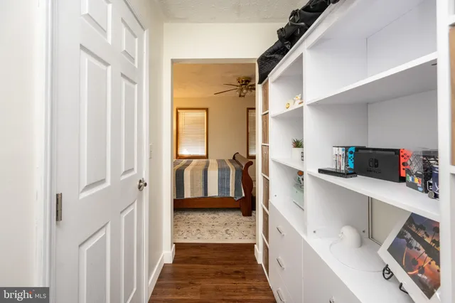 a bathroom with a tub sink and a mirror