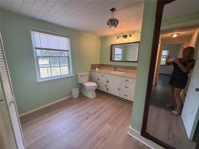 a room with furniture and a window