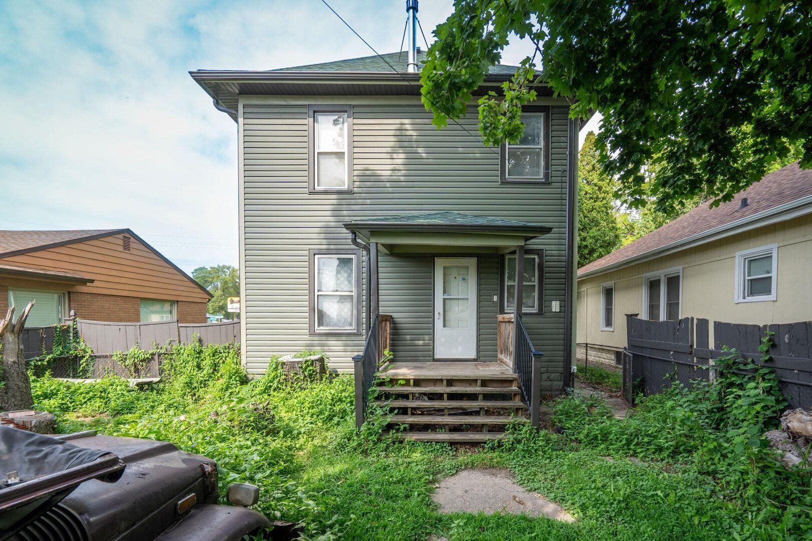 1721 28th Street Rock Island, IL 61201 - Photo 21 of 27 a front view of a house with a yard