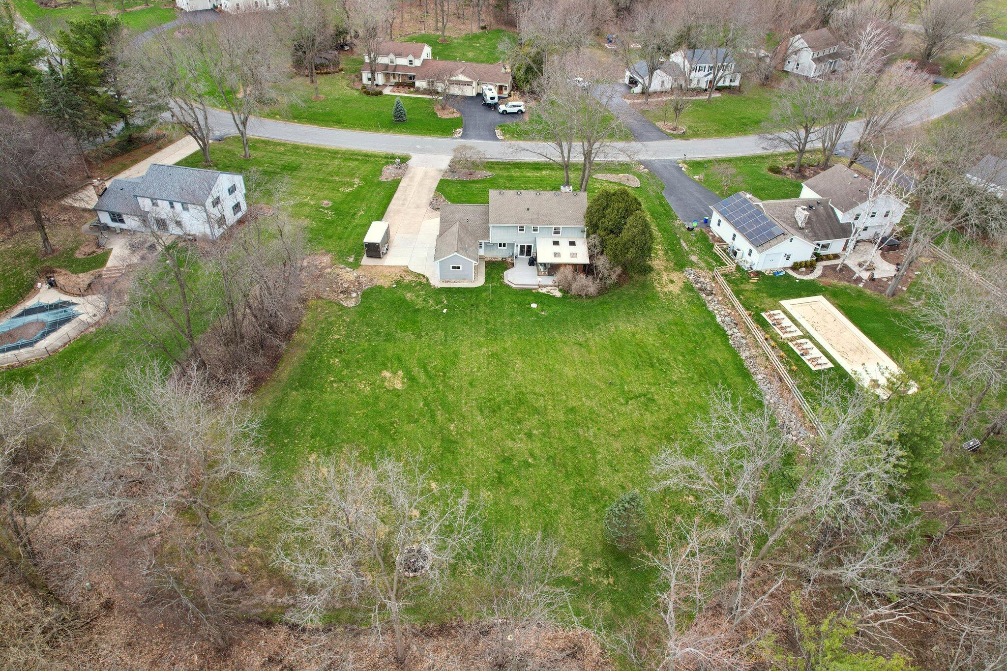 N61W29595 South Woodfield Road Merton, WI 53029 - Photo 42 of 44 Mature trees will soon leaf out to create more privacy