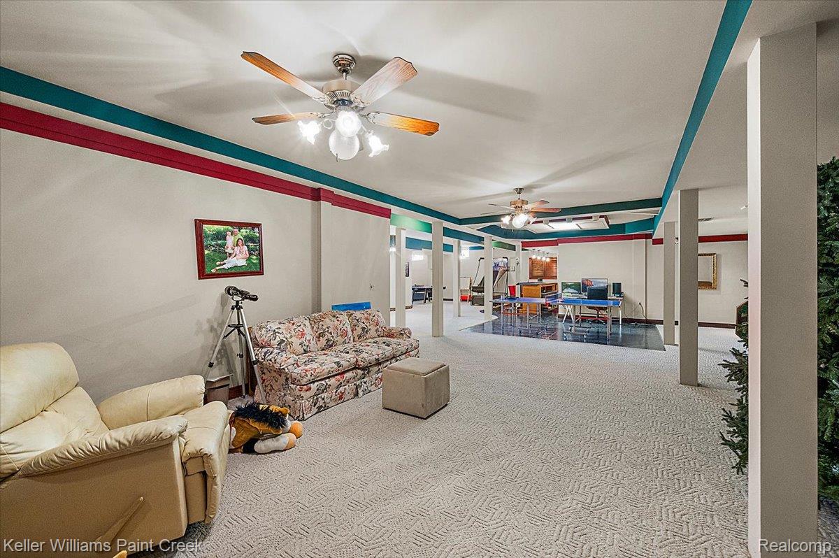 69069 Campground Road Romeo, MI 48065 - Photo 71 of 78 Spacious lower level featuring patterned carpet and a distinct tiled section