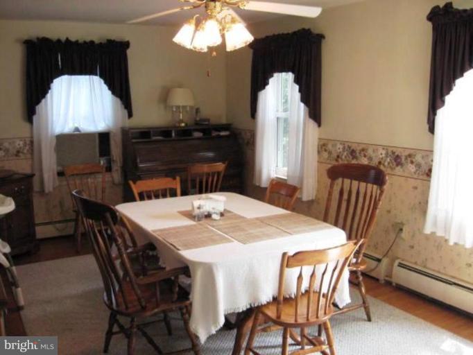 2805 Harford Road Fallston, MD 21047 - Photo 6 of 9 a view of a dining room with furniture and chandelier