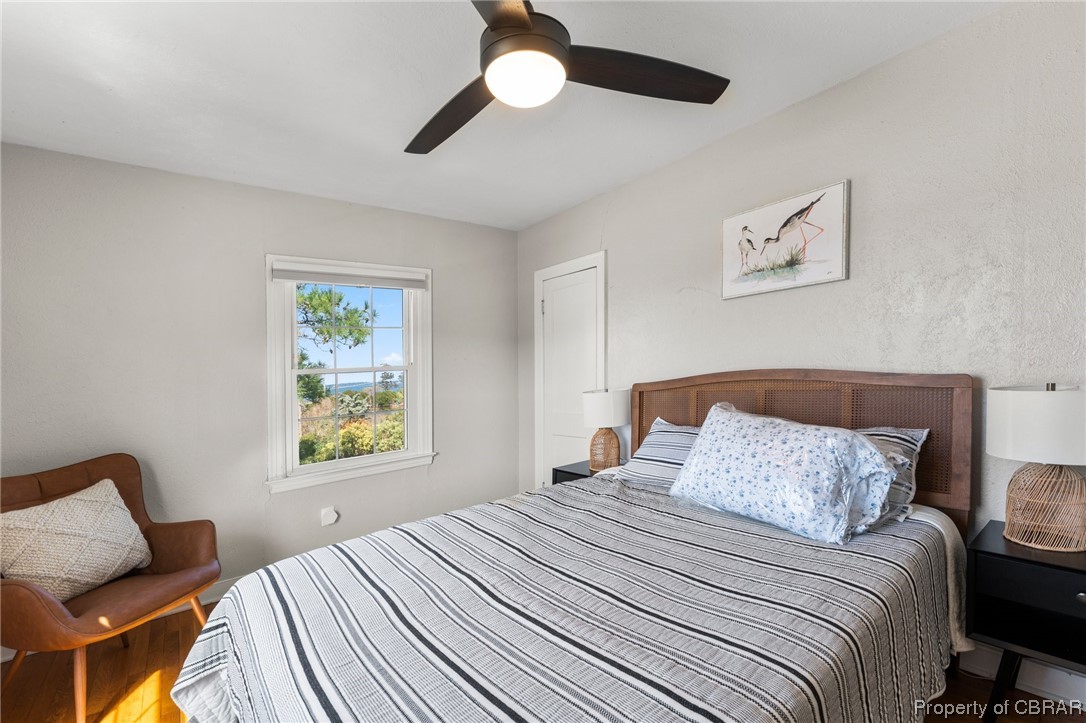 2218 Mill Creek Road Wake, VA 23176 - Photo 32 of 41 Bedroom with hardwood floors and ceiling fan