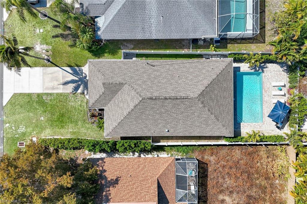 761 99th Avenue North Naples, FL 34108 - Photo 22 of 31 Bird's eye view of a pool area