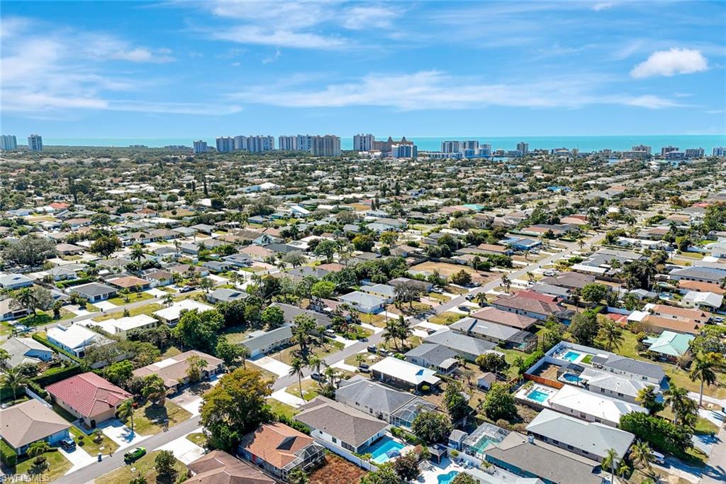 761 99th Avenue North Naples, FL 34108 - Photo 26 of 31 Aerial overview of property's location featuring skyline