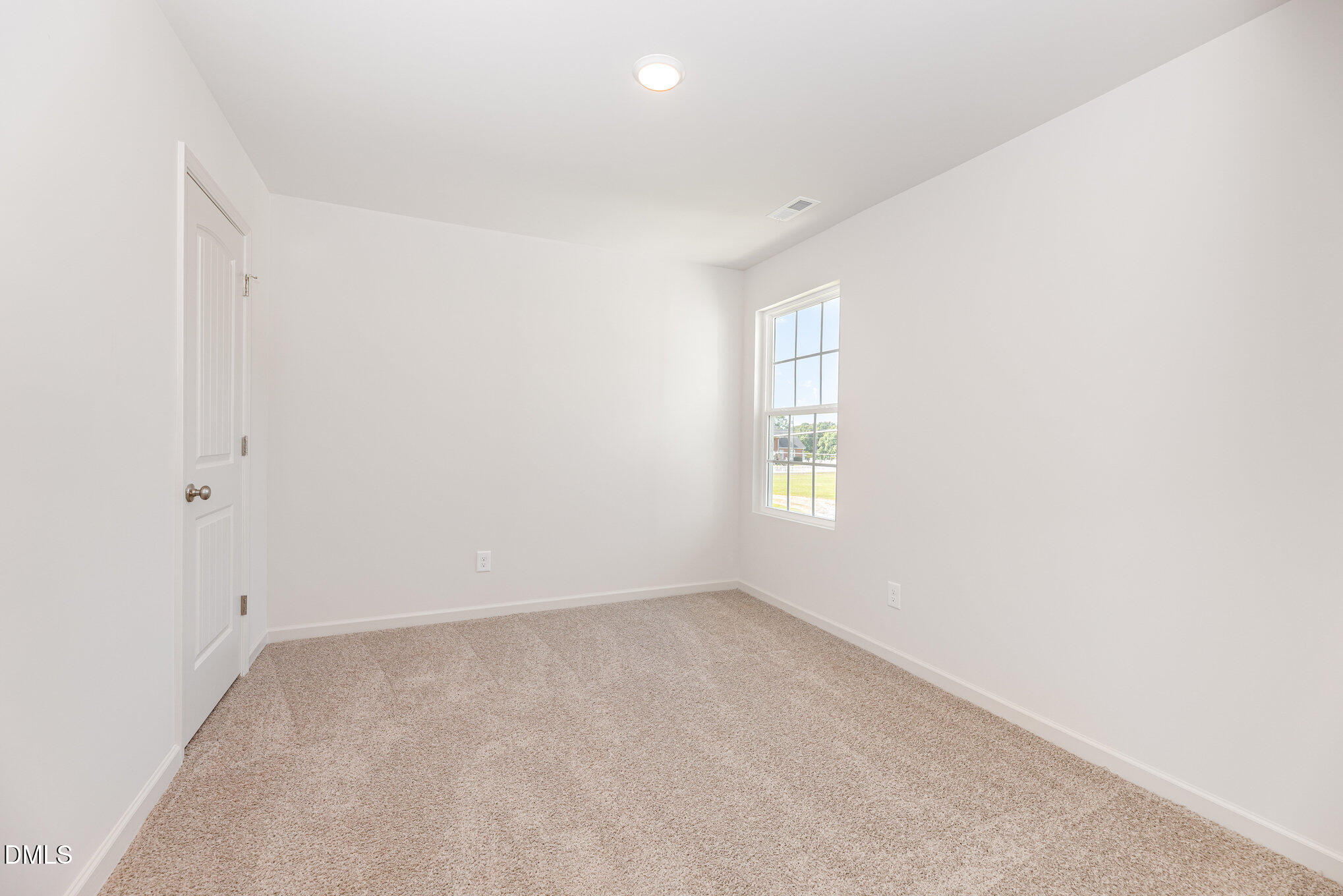 2302 Broad Street Durham, NC 27704 - Photo 15 of 16 an empty room with a window