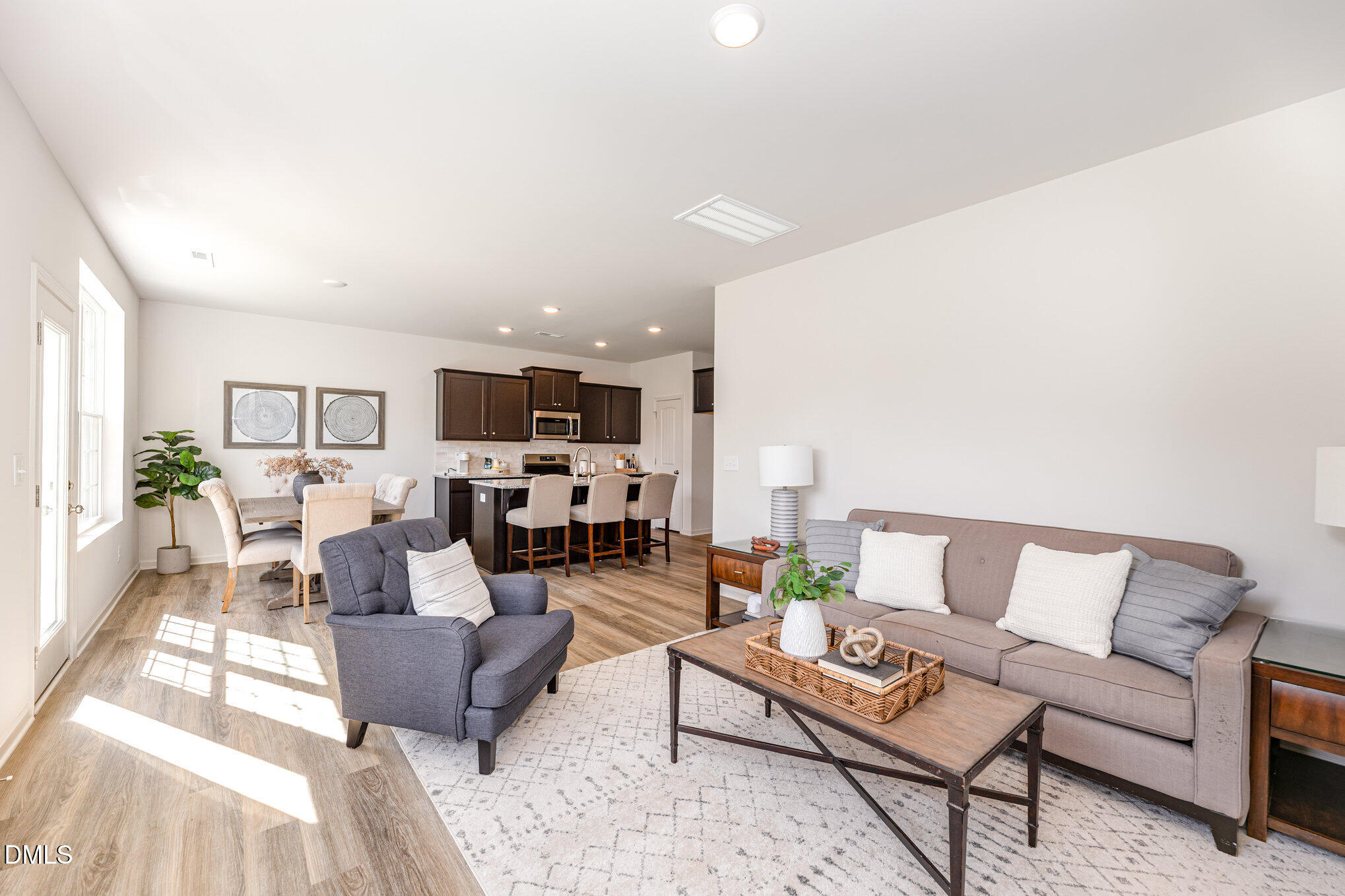 2302 Broad Street Durham, NC 27704 - Photo 3 of 16 a living room with furniture and view of kitchen
