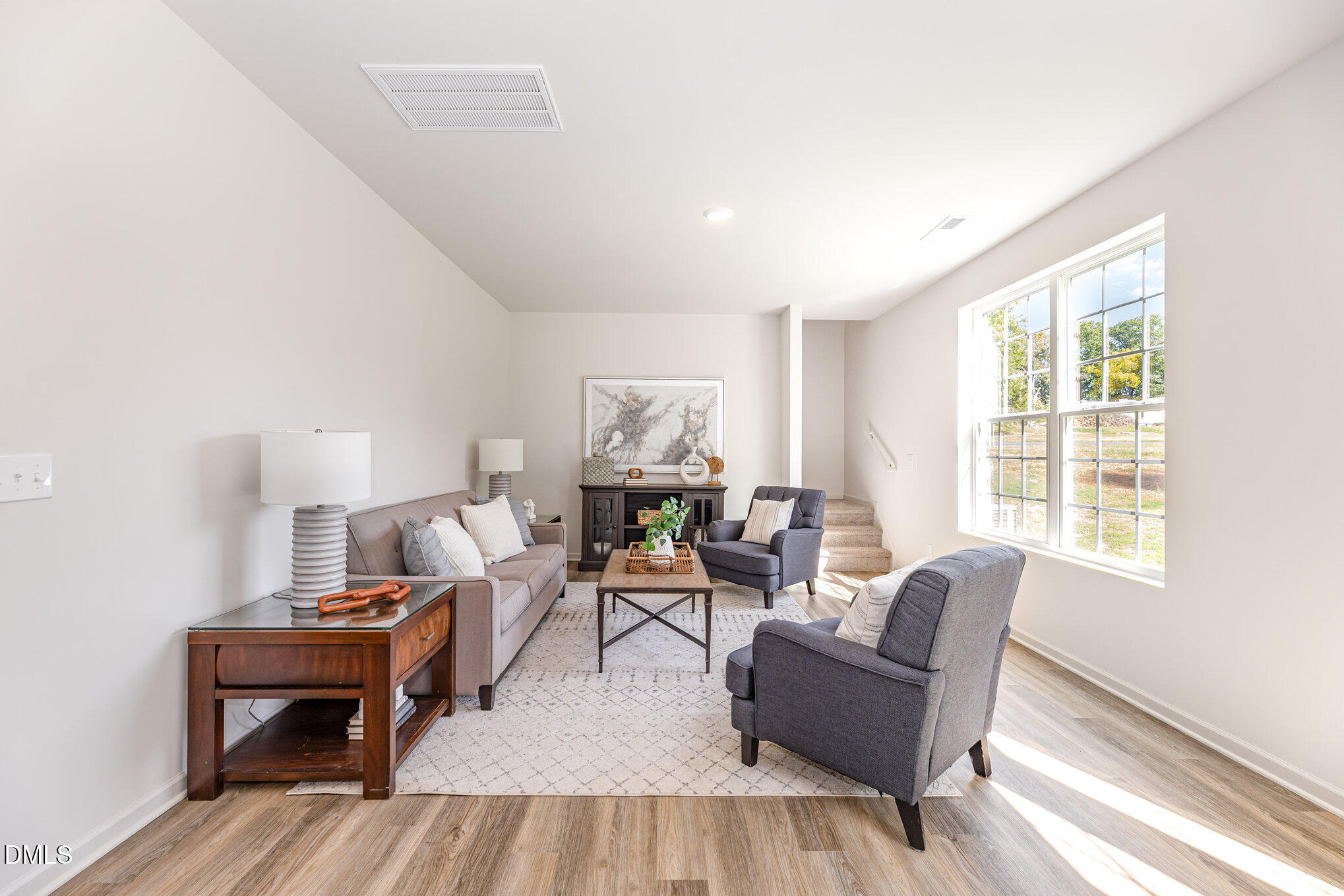 2302 Broad Street Durham, NC 27704 - Photo 4 of 16 a living room with furniture and a window