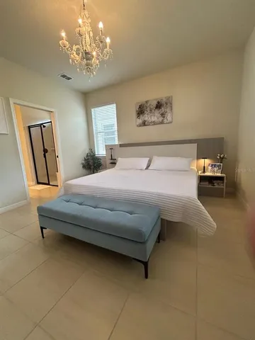 a bathroom with a double vanity sink and mirror