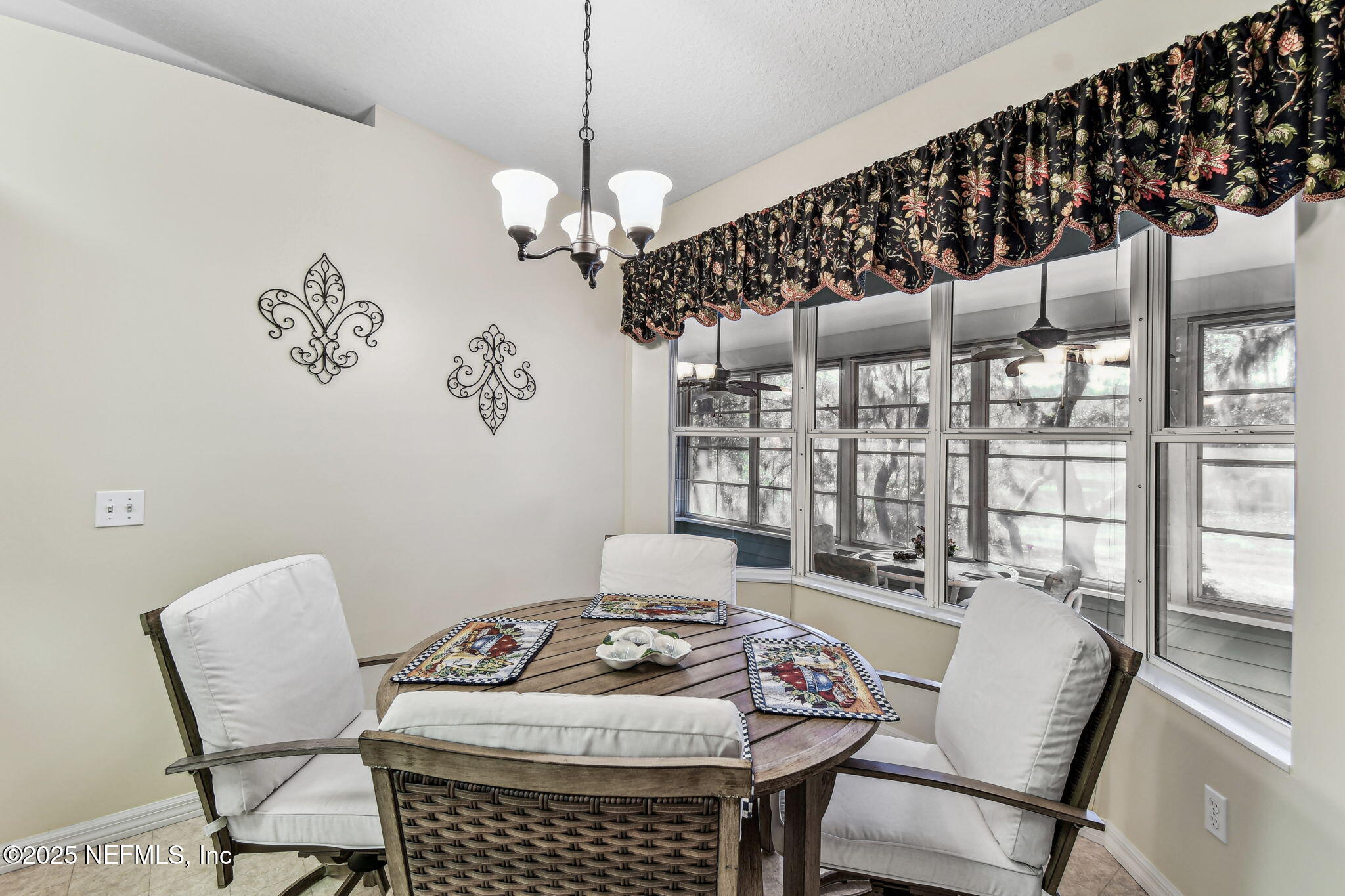 117 Gator Trail Melrose, FL 32666 - Photo 15 of 67 a view of a dining room with furniture window and outside view