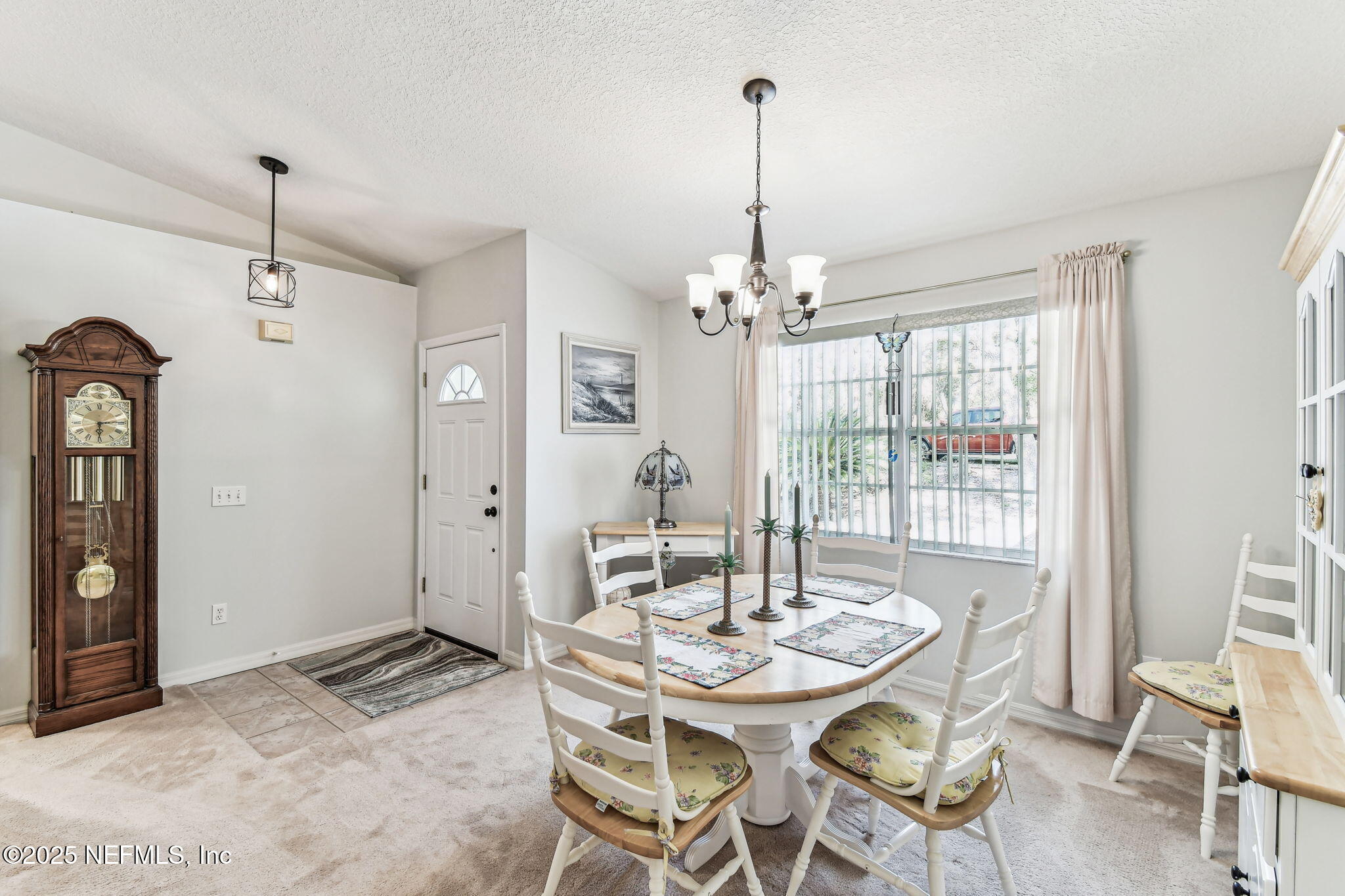 117 Gator Trail Melrose, FL 32666 - Photo 19 of 67 a view of a dining room with furniture window and outside view