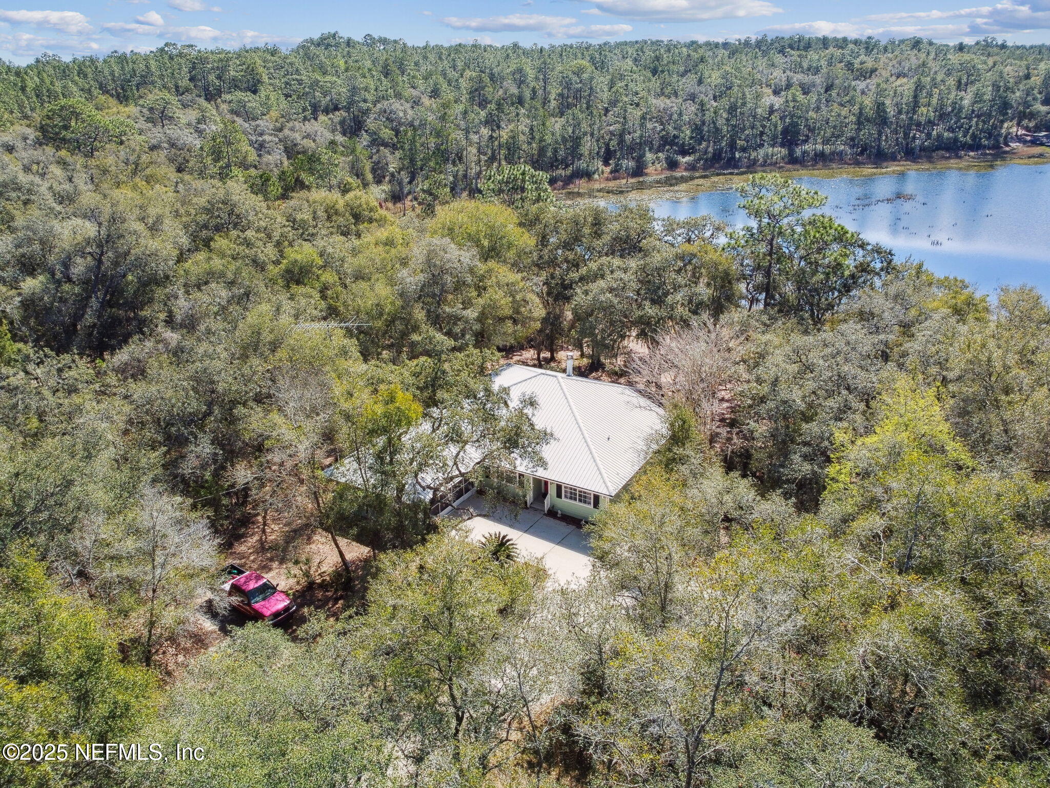 117 Gator Trail Melrose, FL 32666 - Photo 53 of 67 a backyard of a house with lots of green space