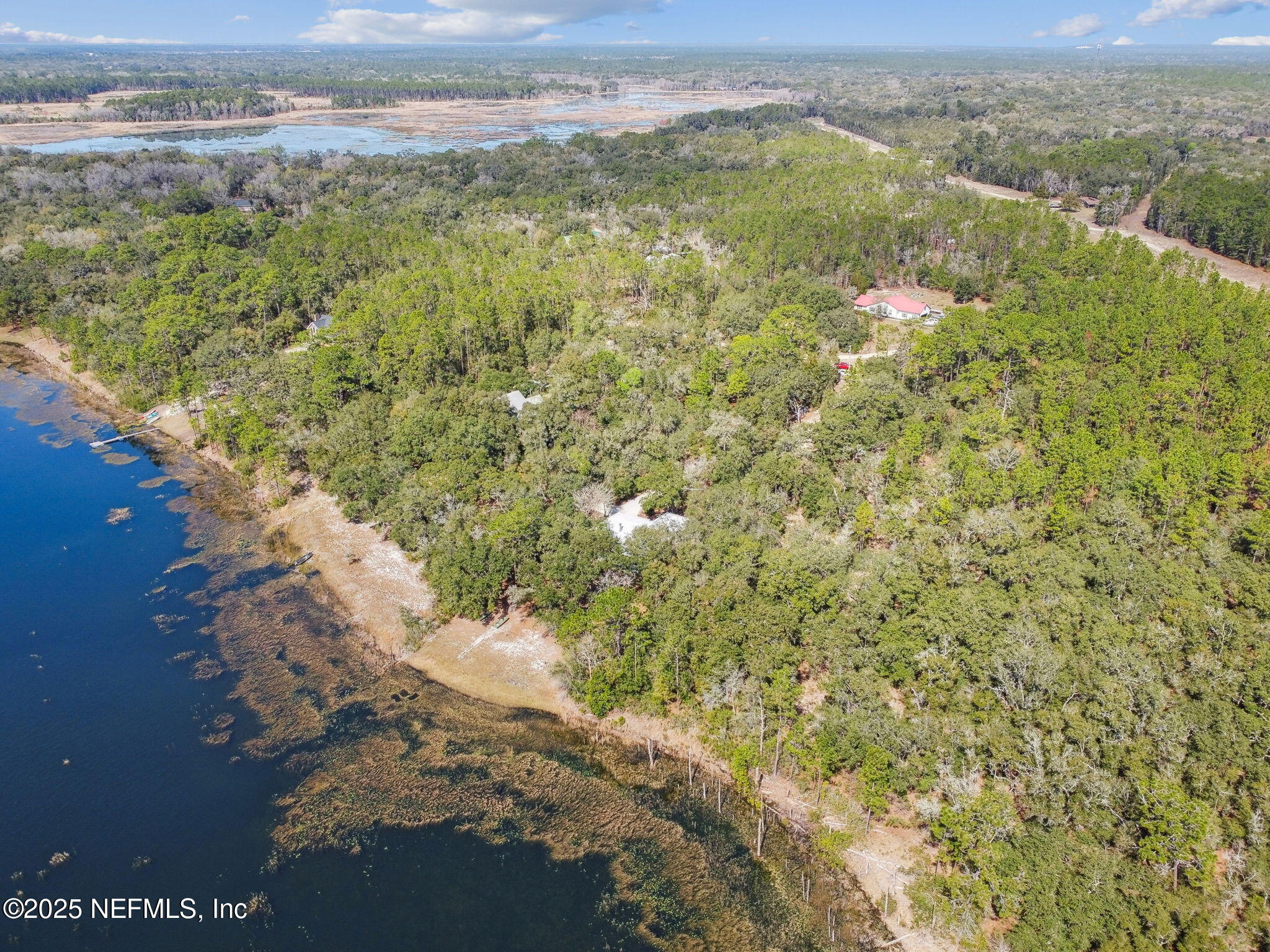 117 Gator Trail Melrose, FL 32666 - Photo 67 of 67 a view of a lake with a mountain