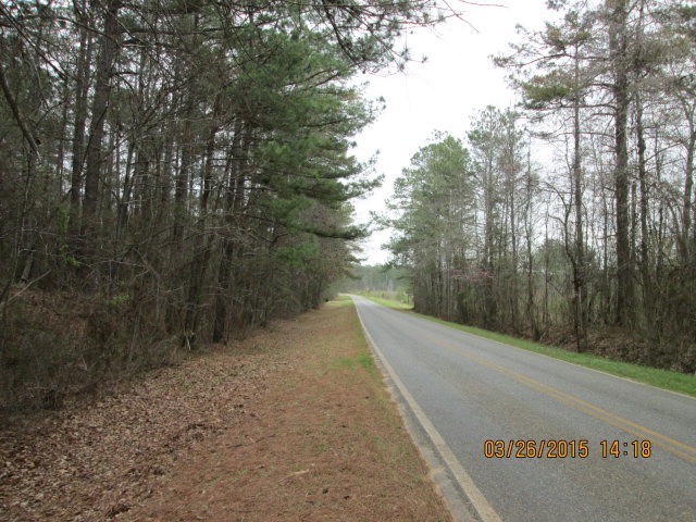 - Howard Roberts Road Gray, GA 31032 - Photo 5 of 5 a view of a road with trees in the background