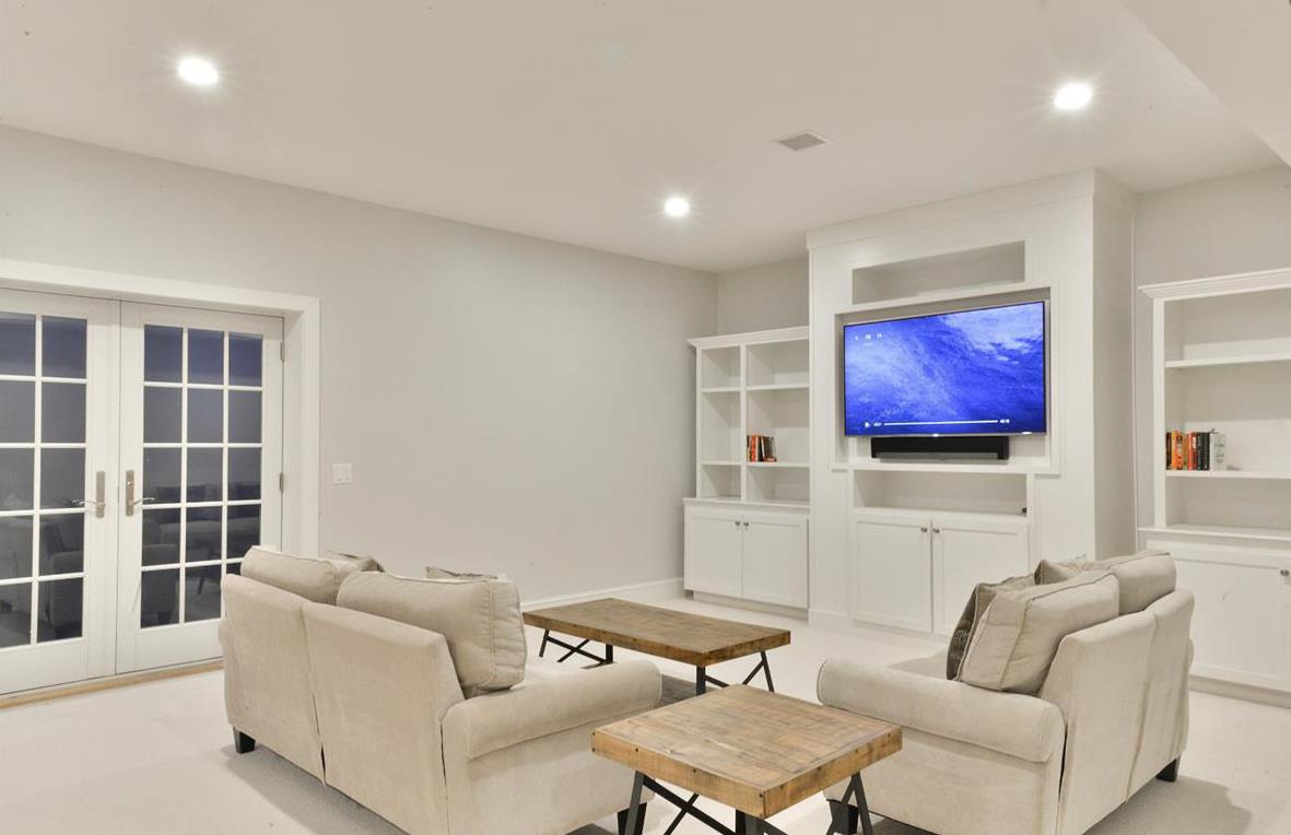 50 Lovers Lane Nantucket, MA 02554 - Photo 28 of 34 a living room with furniture and a flat screen tv