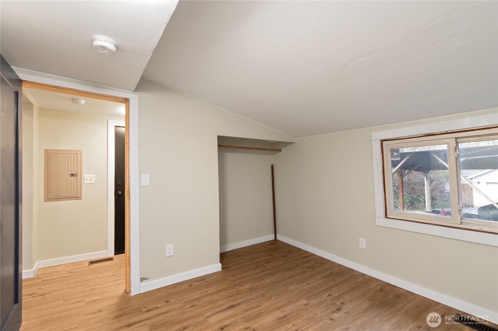 2013 8th Street Bremerton, WA 98337 - Photo 21 of 22 an empty room with wooden floor and windows