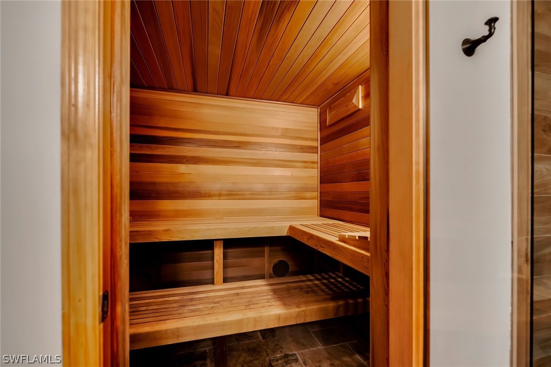 8347 Midnight Pass Road Sarasota, FL 34242 - Photo 27 of 34 a view of walk in closet