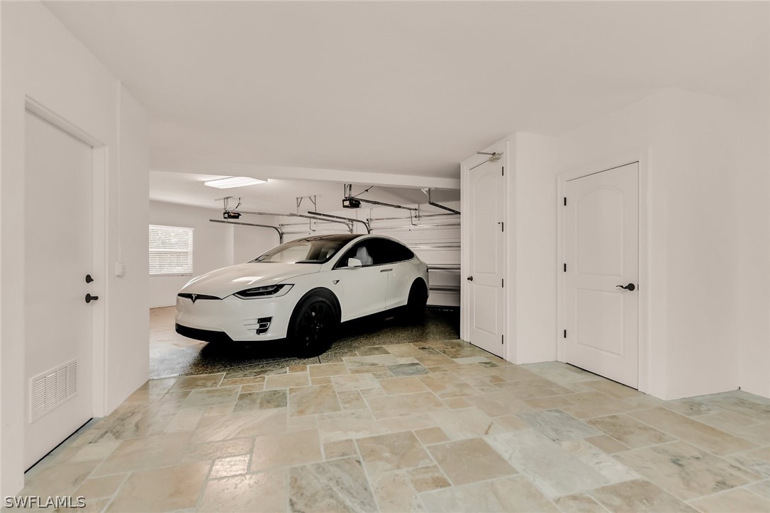 8347 Midnight Pass Road Sarasota, FL 34242 - Photo 28 of 34 a view of car parking