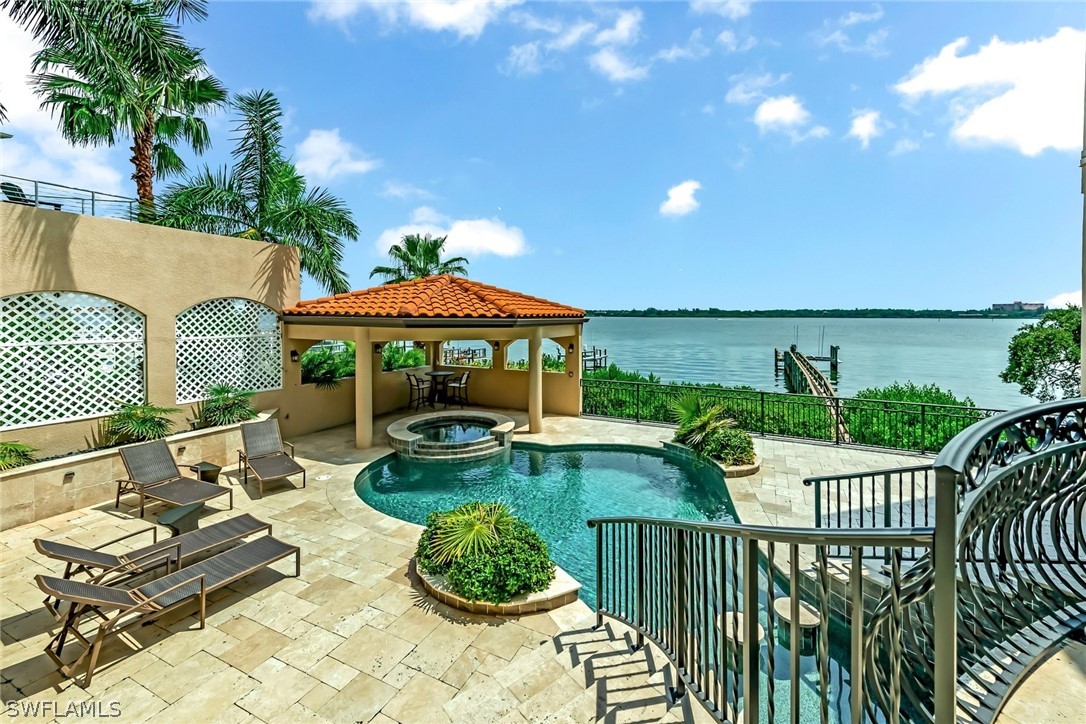 8347 Midnight Pass Road Sarasota, FL 34242 - Photo 30 of 34 swimming pool view with a seating space