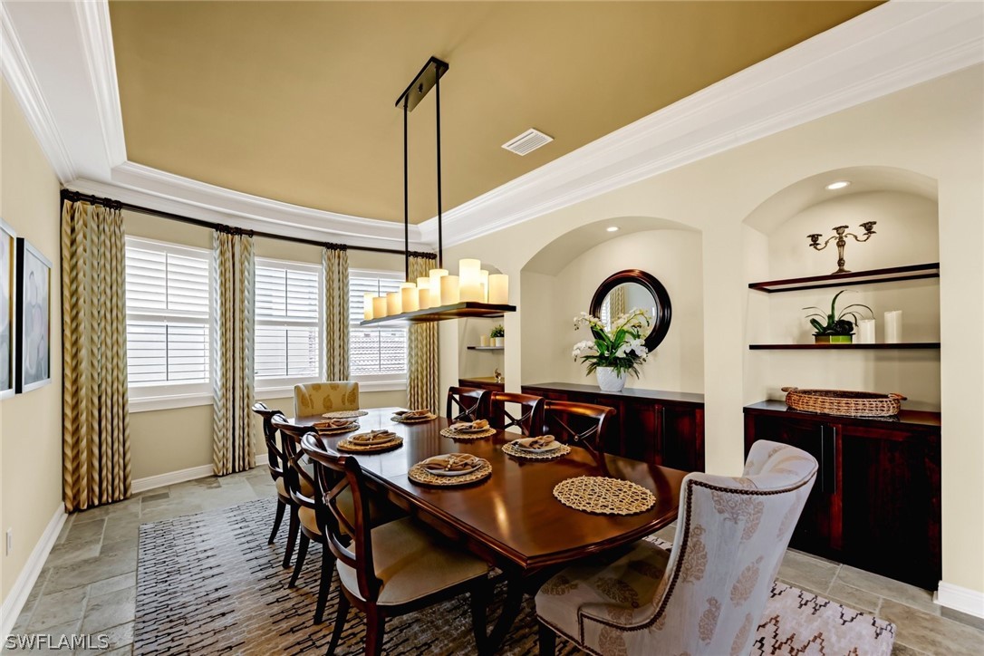8347 Midnight Pass Road Sarasota, FL 34242 - Photo 8 of 34 a dining room with furniture and window